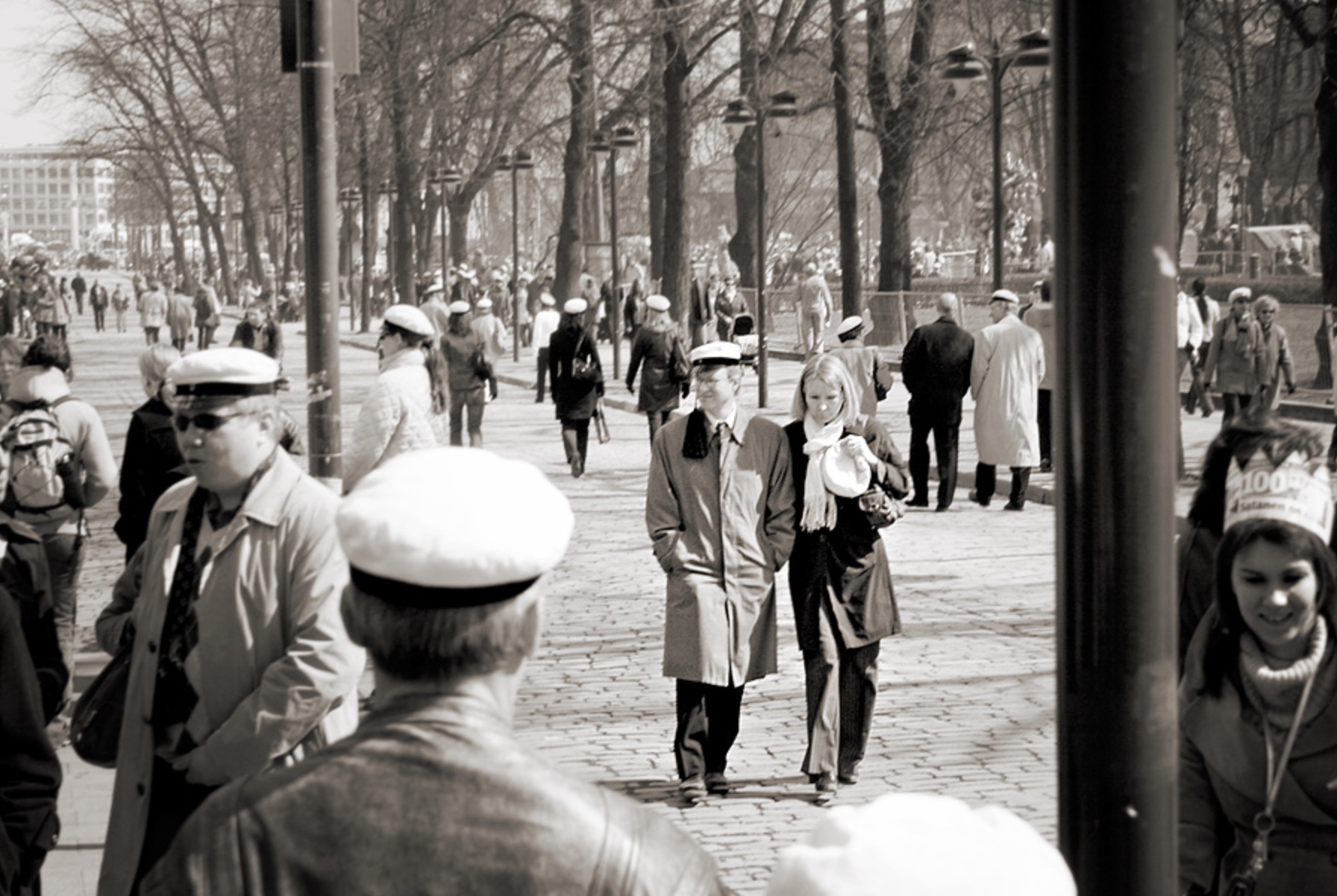 Students on Helsinki's Esplanadi wearing their caps on Vappu 